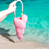 Crocheted opalescent spiral shell bag