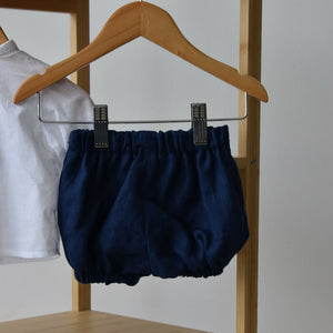 Cream shirt and blue trousers  (2)