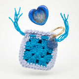 Resin worry stone with crochet pouch