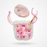 Resin worry stone with crochet pouch