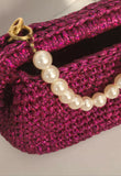 Crochet festive fuchsia clutch
