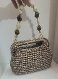 Crochet festive silver clutch