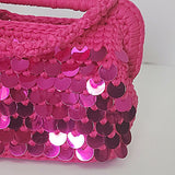 Crochet fuchsia clutch bag