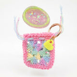 Resin worry stone with crochet pouch