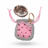Resin worry stone with crochet pouch