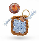 Resin worry stone with crochet pouch