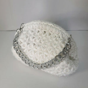 Crochet snowflake clutch bag