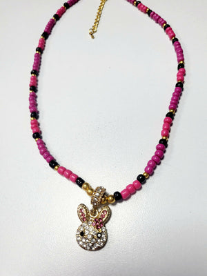 Beaded necklace with charm