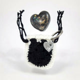 Resin worry stone with crochet pouch