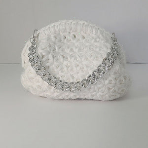 Crochet snowflake clutch bag