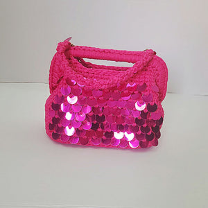Crochet fuchsia clutch bag