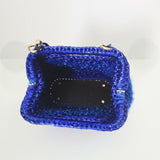 Crocheted sparkly blue clutch bag