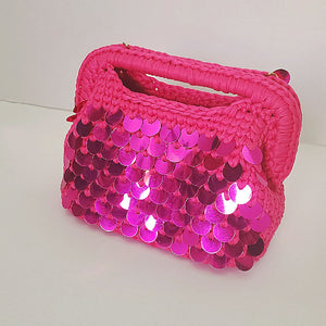 Crochet fuchsia clutch bag