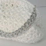 Crochet snowflake clutch bag