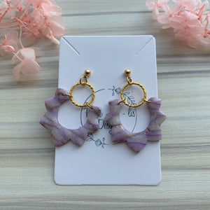Olga in amethyst earrings