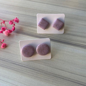 Studs in purple/gold