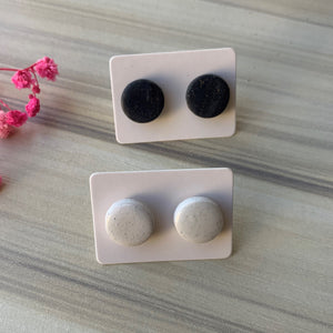 Studs in off-white or off-black