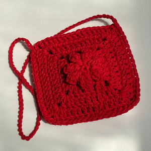 red crochet bag