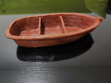 Brown boat dish